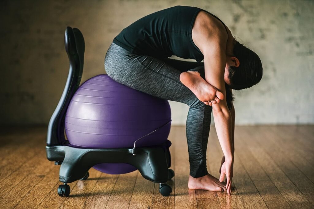 Gaiam Classic Balance Ball Chair – Exercise Stability Yoga Ball Premium Ergonomic Chair for Home and Office Desk with Air Pump, Exercise Guide and Satisfaction Guarantee